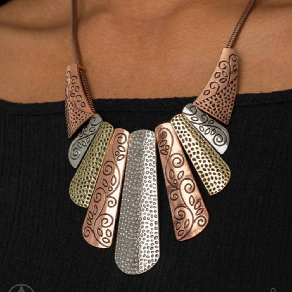 Get UNTAMED with this gorgeous copper, silver and brass tronal necklace.